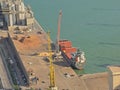 Aerial view on a ship being loaded in the port of Barcelona