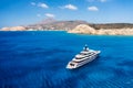 Aerial view of the ship from drone. Blue clear water in the Mediterranean Sea. Summer vacation and travel on a cruise liner.