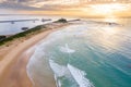 Nobbys Beach and Newcastle Harbour Ship leaving port - aerial view Royalty Free Stock Photo