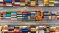 Aerial view of shipping container port terminal. Colourful pattern of containers in harbor. Maritime logistics global