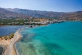 Aerial view showing the causeway connecting Elounda to Kolokitha island along with the remains of the Minoan city of Olous Crete Royalty Free Stock Photo