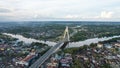 Aerial view of Siak Bridge IV Abdul Jalil Alamuddin Syah Bridge above Siak River Sungai Siak in Pekanbaru top view. Pekanbaru