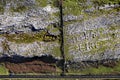 Aerial view on sign Ireland in Irish language 48 EIRE made out of rocks in Burren area by a road. West of Ireland. Popular travel