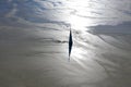 Aerial view of silhouette of church tower flooded by heavy metal residuals from a copper mine. Apocalyptic scene Royalty Free Stock Photo