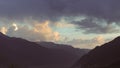 Aerial view of silhouettes of mountains under cloudy sunset sky in Himachal Pradesh, India Royalty Free Stock Photo