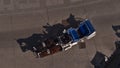 Aerial view of a single fiacre coach with two horses driving on a paved road in the historic center of city Vienna, Austria. Royalty Free Stock Photo