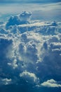 Aerial view through sky above the clouds abstract background.