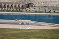 Aerial view of Skydive Dubai Palm Drop main control tower and terminal building near JBR Beach and The Palm