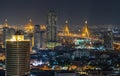 Aerial view of Skyscrapers in the business district and the Bridge crosses the Chao Phraya river of Bangkok city Royalty Free Stock Photo