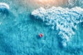 Aerial view of slim young woman swimming on the donut swim ring Royalty Free Stock Photo