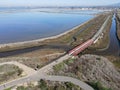 Aerial view of Small bridge on Otay River next to San Diego Bay National Refuger in Imperial Beach, San Diego Royalty Free Stock Photo