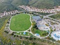 Aerial view of small community park in middle class neighborhood in the valley during clouded day Royalty Free Stock Photo