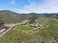 Aerial view of small community park in middle class neighborhood in the valley during sunny day Royalty Free Stock Photo