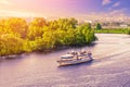 Aerial view of a cruise ship floating on the river on background of sunset sky Royalty Free Stock Photo