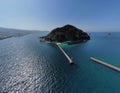 Aerial view of a small island covered with greenery in Japan on a sunny day Royalty Free Stock Photo