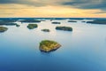 Aerial view of of small islands on a blue lake Saimaa. Landscape with drone. Blue lakes, islands and green forests from above on a Royalty Free Stock Photo