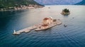 Aerial view of small islands of Ostrvo and Sveti Juraj monastery in the bay of Kotor, Montenegro