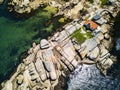 Aerial view of a small lighthouse in Galicia Royalty Free Stock Photo