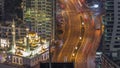 Aerial view of the small mosque of Dubai Marina illuminated by night timelapse Royalty Free Stock Photo