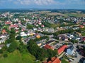 Aerial view on a small polish city with trees and fields