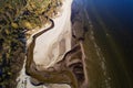 Aerial view of small river on Baltic sea beach, Latvia.