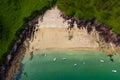 Aerial view of a small sandy bay in Wales