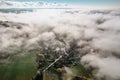 Aerial view of small village in fog.Top view of traditional housing estate in Czech.Looking straight down with satellite image Royalty Free Stock Photo