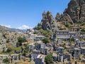 Aerial view of the Small village of Pentedattilo, church and ruins of the abandoned village, Greek colony on Mount Calvario, whose