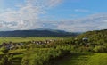 Aerial view of small village surrounded by mountains Karpaty Ukraine