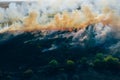 Aerial view smoke clouds of wild fire. Fire in forest spreads, natural disaster Royalty Free Stock Photo