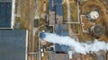 Aerial view smoking chimney of the gas boiler plant. Ecological problem