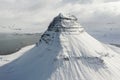 Aerial view of the snow-capped Mount Kirkjufell in early spring in Iceland. Royalty Free Stock Photo