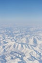 Aerial view of snow-capped mountains and river