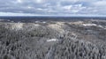 Aerial view of the snow-clad peaks and mosaic landscape of the Haanja upland, Voru county, Estonia