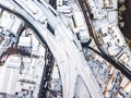 Aerial view of snow compromised rail and road networks.