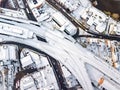 Aerial view of snow compromised rail and road networks.