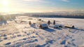 Aerial Winter Landscape With House And Barn In Morning Sunshine