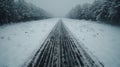 Aerial view of a snowy asphalt slippery winter road in the fog