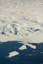 Aerial view of the snowy ice-covered landmass in Antarctica