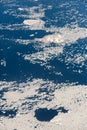 Aerial view of the snowy ice-covered landmass in Antarctica