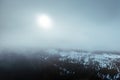 Aerial view of snowy mountain range in cloud Royalty Free Stock Photo