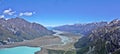 Aerial view of Snowy mountain view with unbelievably blue glacier lake