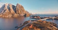 Aerial view of snowy mountains, islands, rorbuer, sea in winter