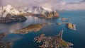 Aerial view of snowy mountains, islands, rorbuer, sea in winter