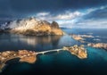 Aerial view of snowy rocks, islands, sea, bridge, cloudy sky Royalty Free Stock Photo