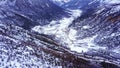 Aerial view of snowy valley of Chola Mountain