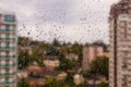 Aerial view of Sochi through wet glass, Russia