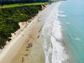 Aerial view of soft ocean waves with foam on a sandy beach Royalty Free Stock Photo