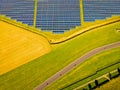 Aerial view of solar batteries field in english countryside Royalty Free Stock Photo