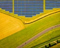 Aerial view of solar batteries field in english countryside Royalty Free Stock Photo